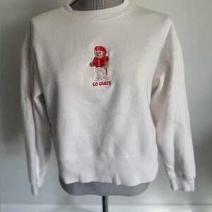 White crewneck with embroidered Cheifs design